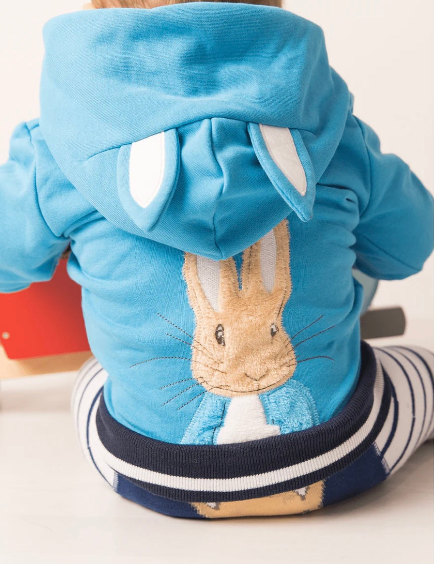 Blue children's hoodie with a rabbit design on a white background